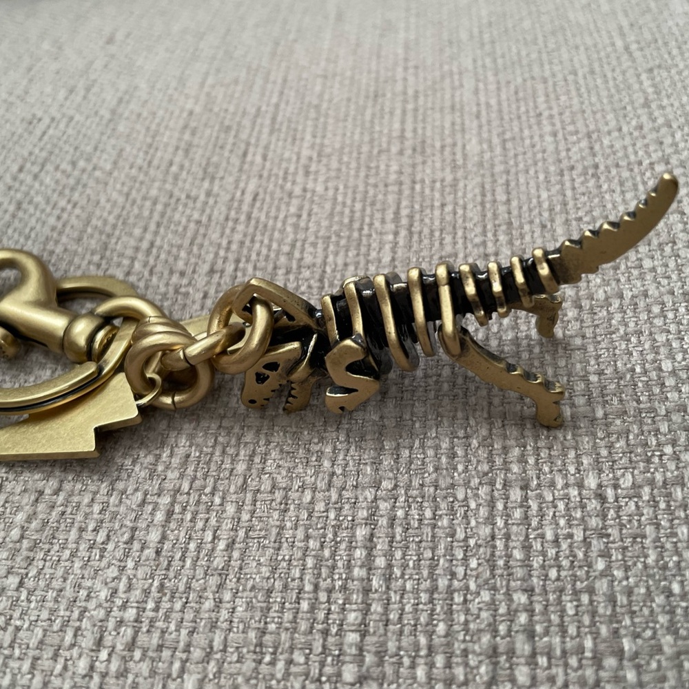Coach Small Rexy Skeleton Bag Charm in colour brass - Picture 9 of 13